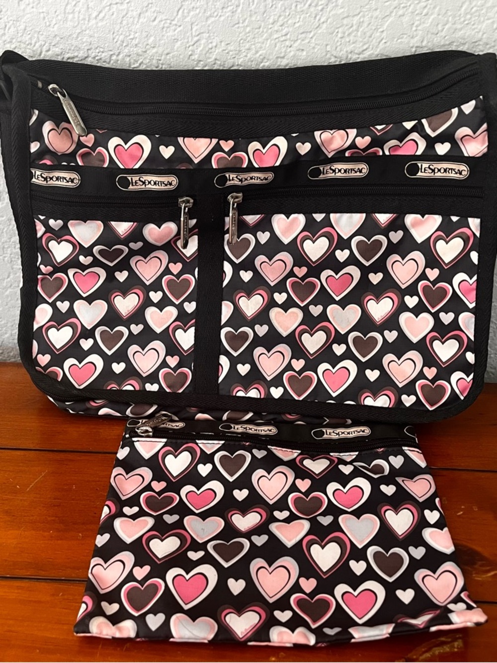 LeSportsac Black Crossbody with Pink and White Heart Print